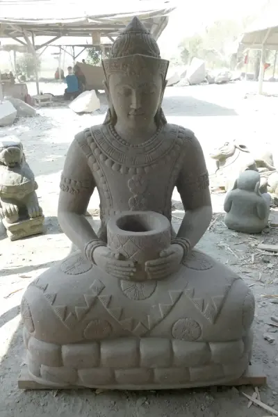 Product image 2 of the product “Seated Buddha in Thai style made of Riverstone, Holds a vessel in his hands, H. 150cm. ”
